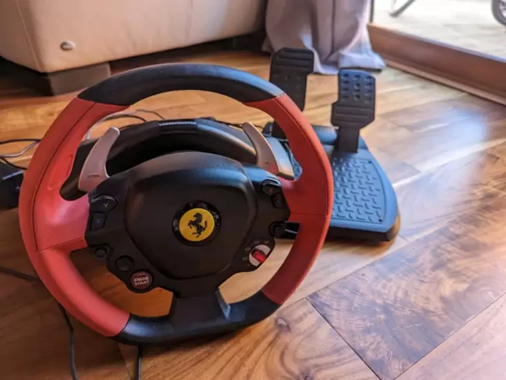 £75.00 Ferrari Thrustmaster steering wheel and pedals